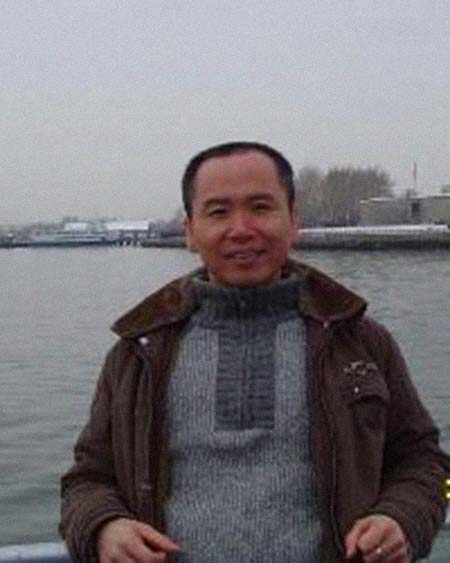 康明义